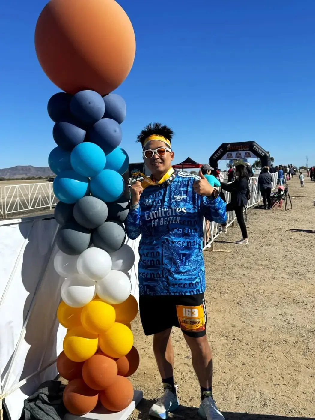 A flight-themed Race to the Runway medal