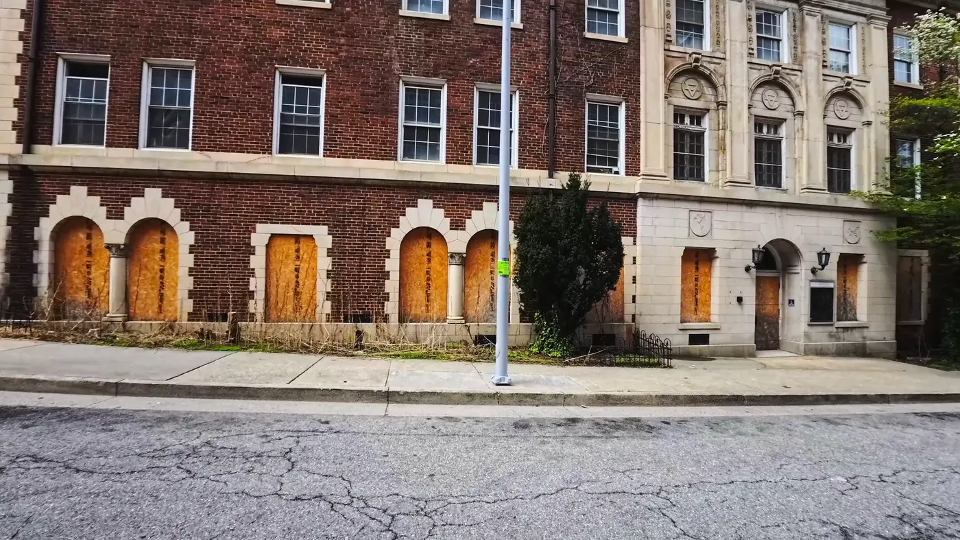 Old brick building beside the course