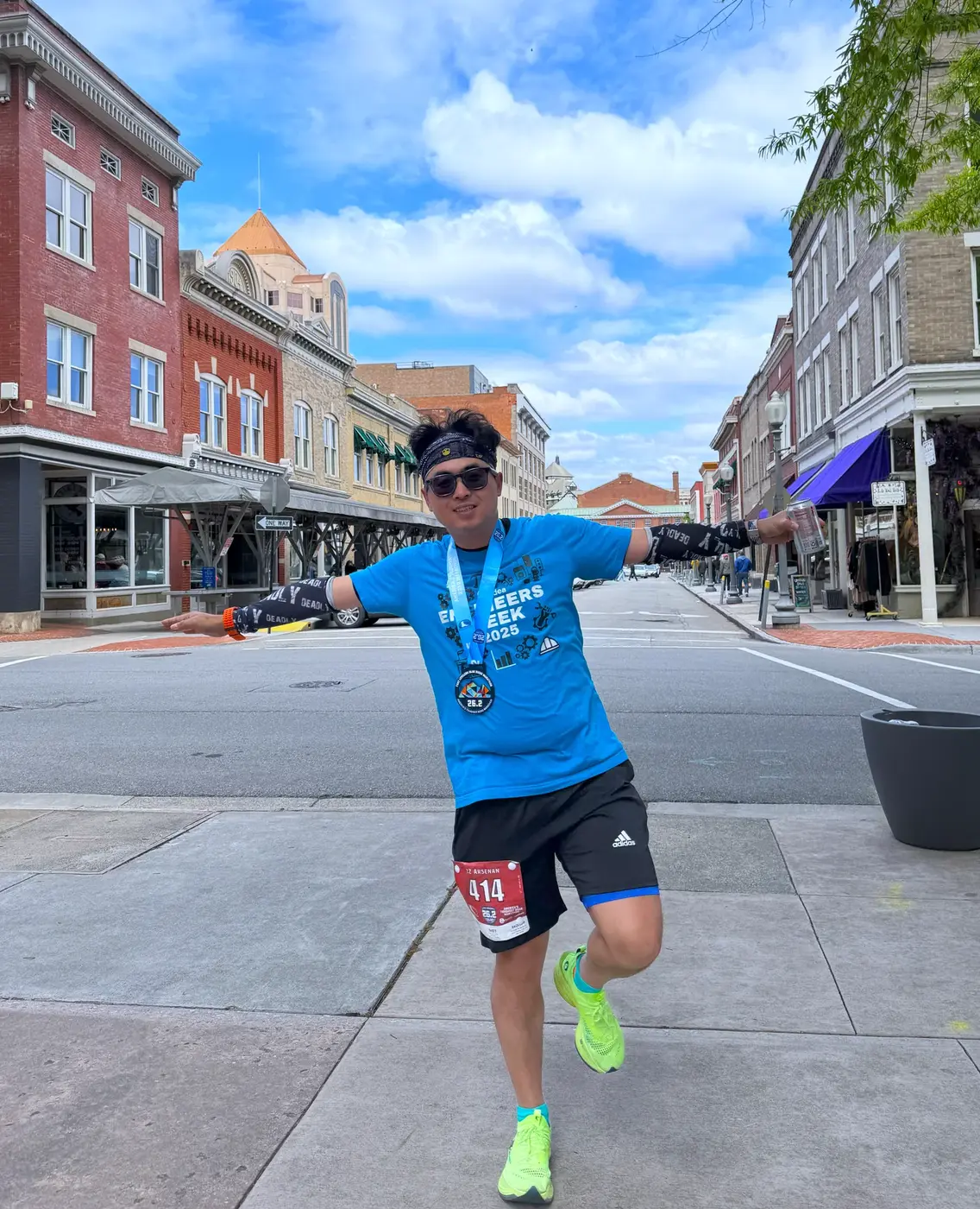 Another medal pose on the brick street