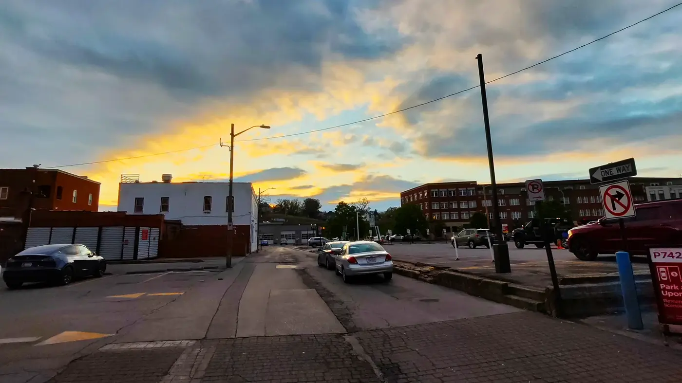Evening color over old brick buildings