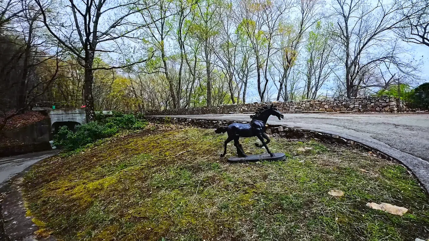 Horse sculpture beside the road