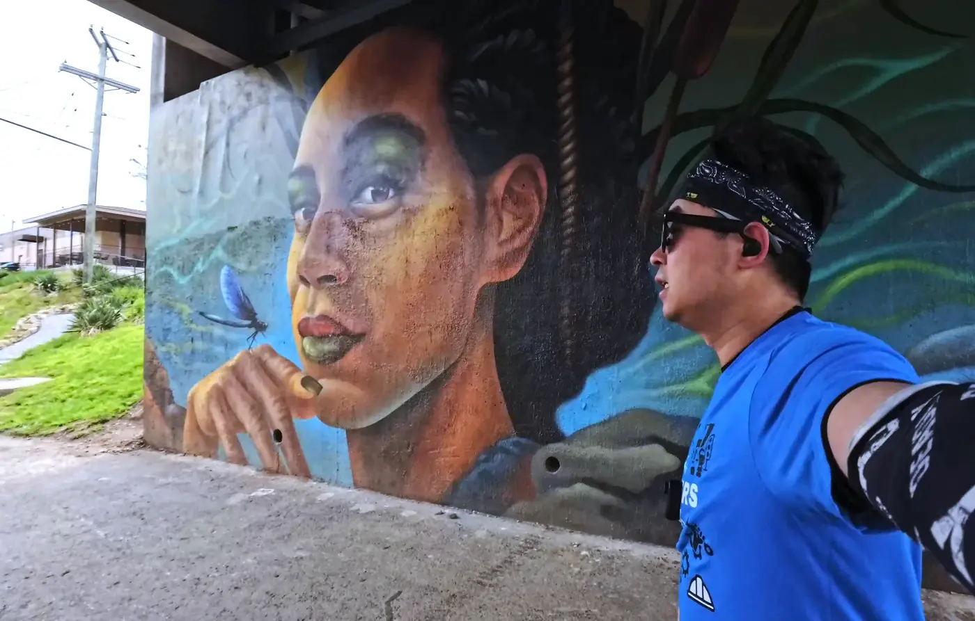 Colorful mural under the road bridge
