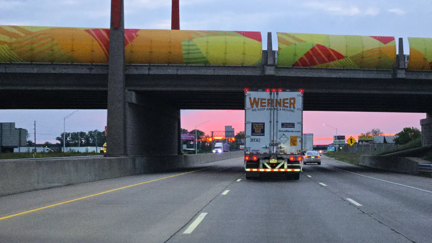 Crossing under a colorful overpass