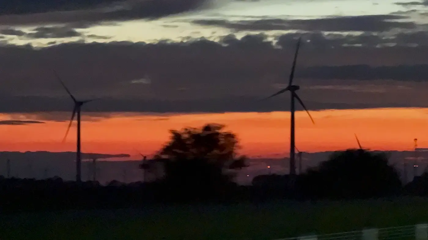 Wind turbines at dusk on the plains