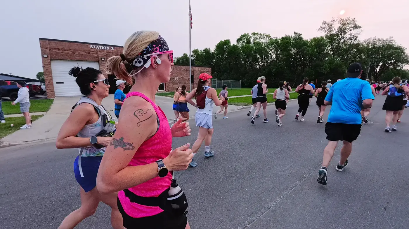 Runners turning through Fargo side streets