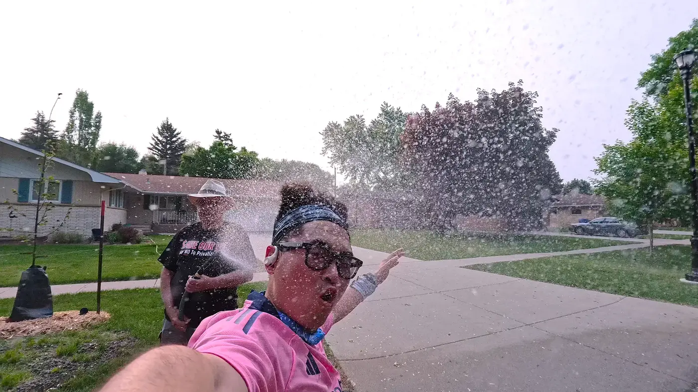 Sprinkler spray on a hot Fargo mile