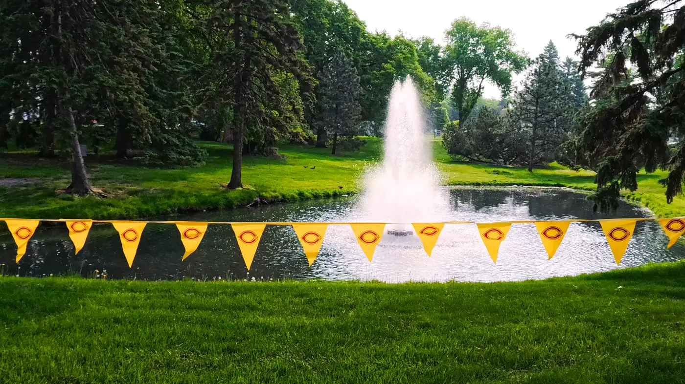 Fountain and race flags on campus