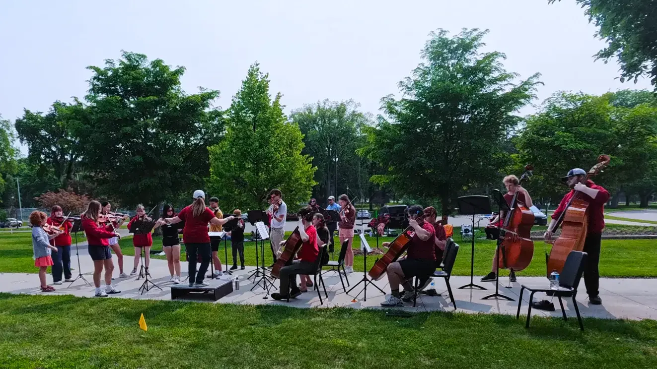 Brass band playing on the grass