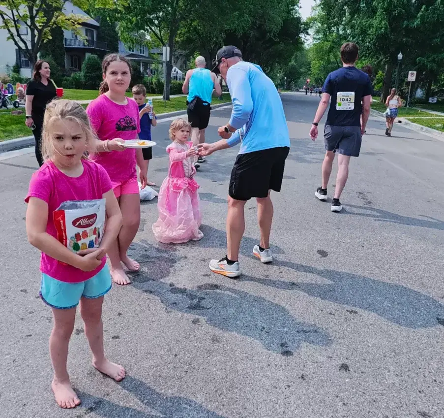 Kids cheering on the neighborhood street