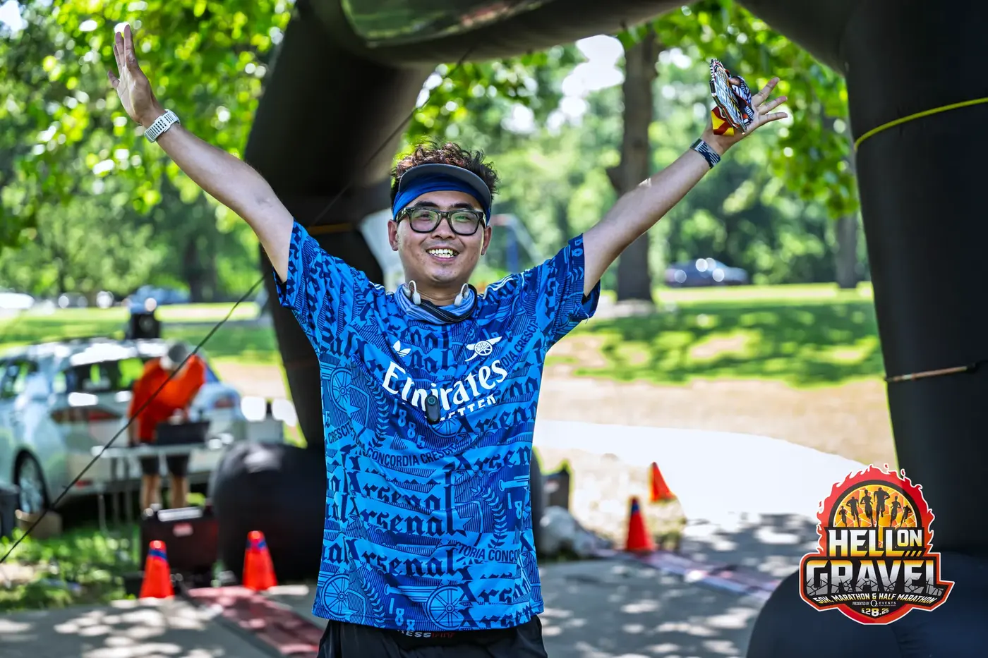 Hell on Gravel finish photo with medal