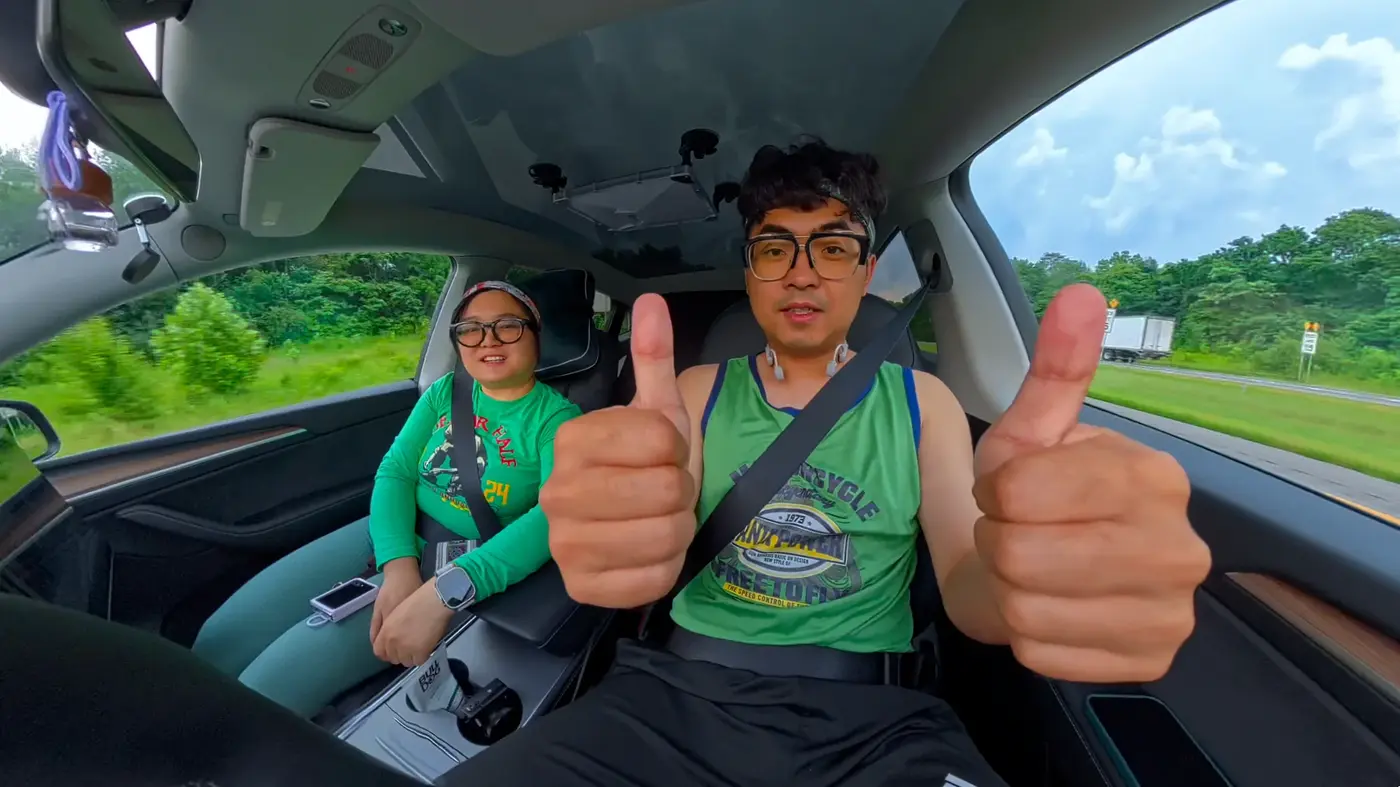 Thumbs-up from the road trip car