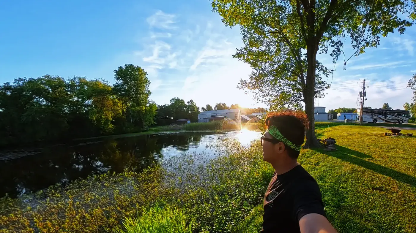 Sunlit pond walk before race day