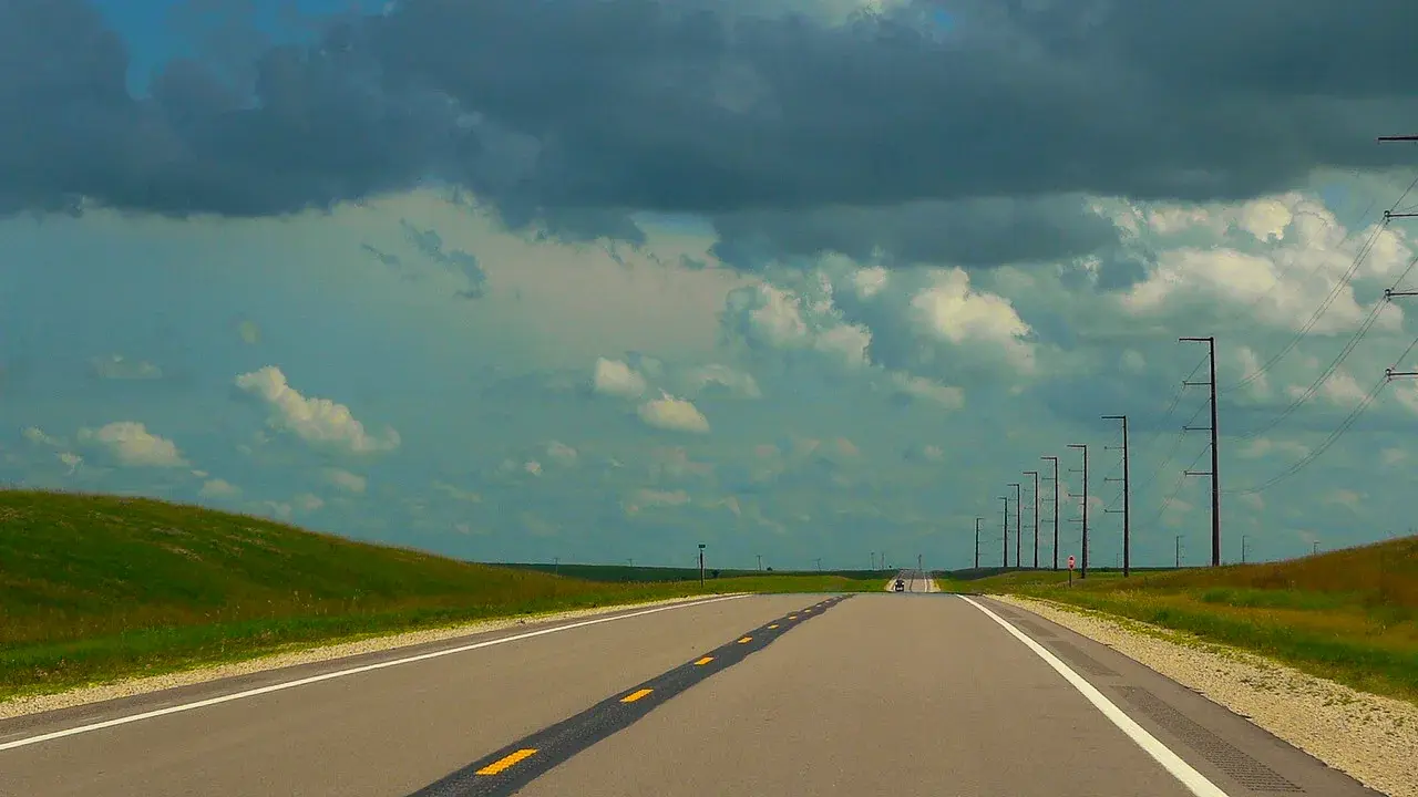 Empty road into the Flint Hills