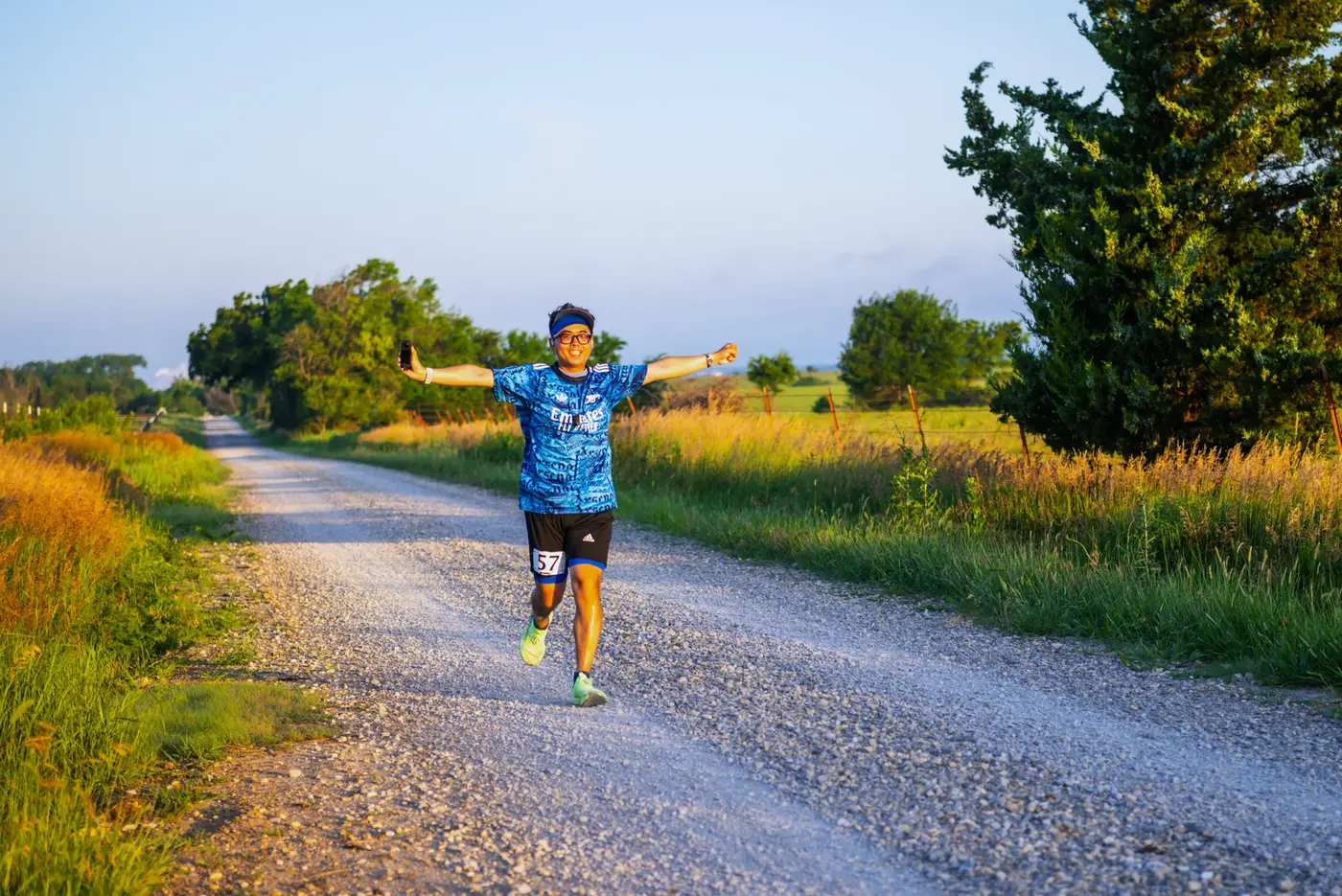 Official shot running down the gravel road