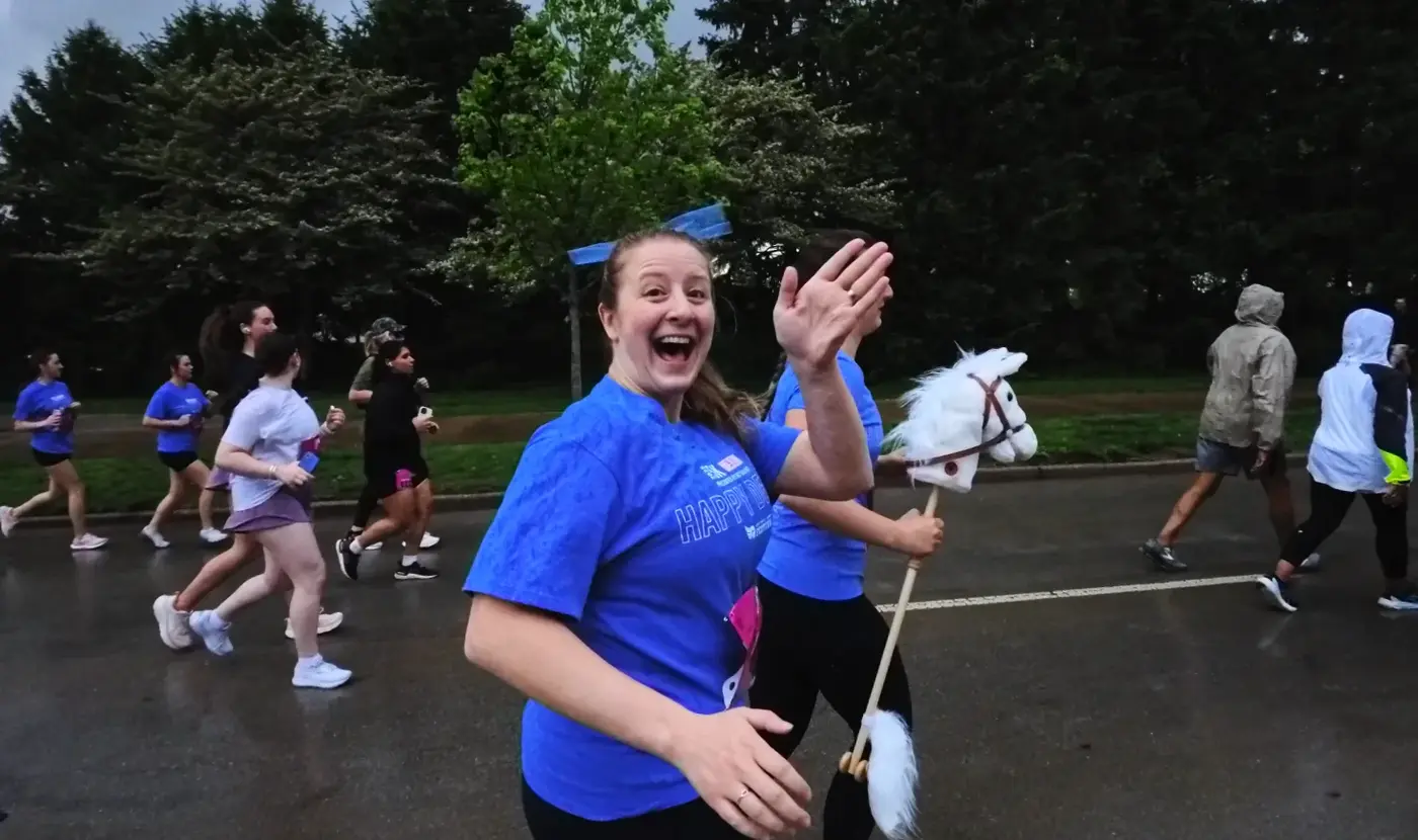 Siqi smiling through the Friday night 5K