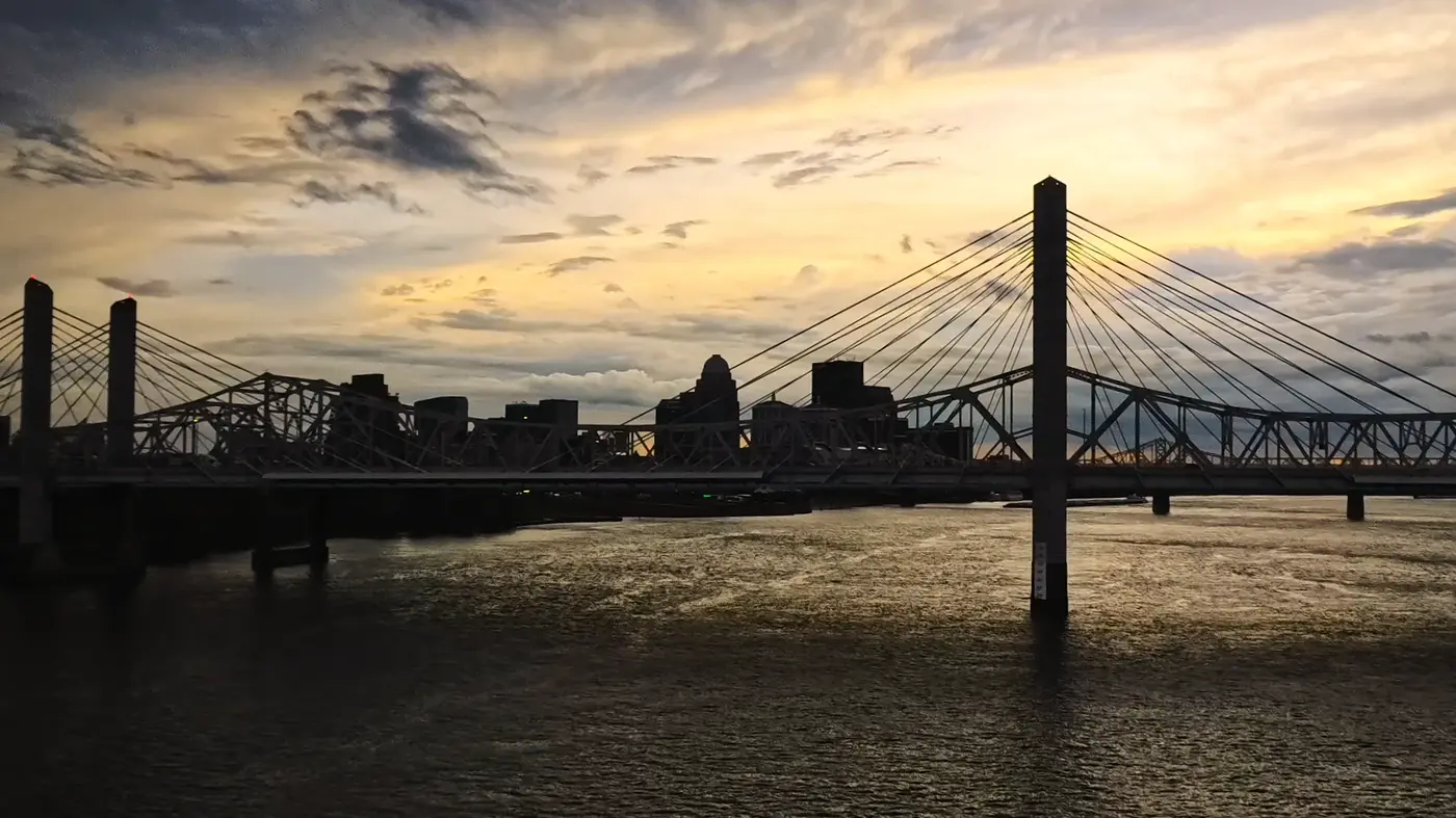 Louisville bridges glowing at sunset