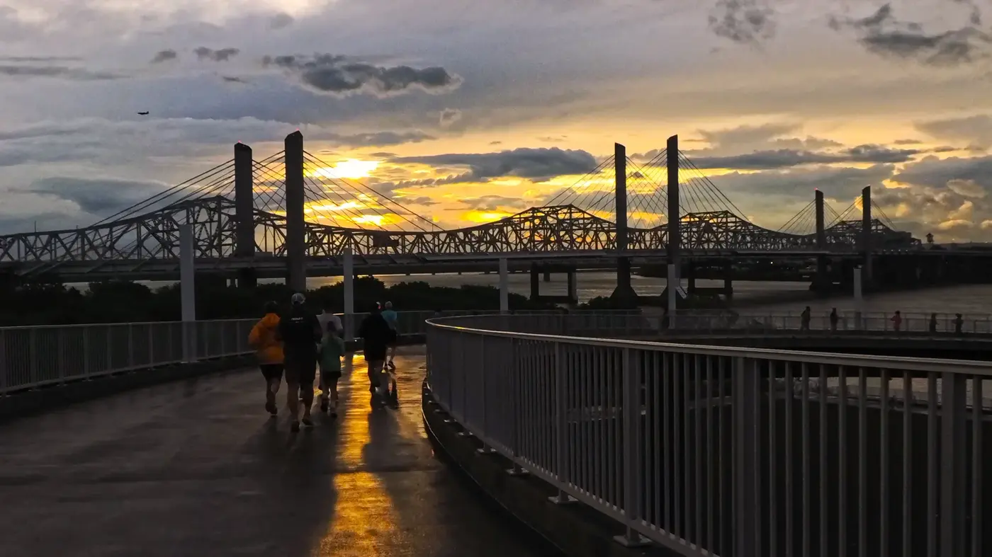 Wet bridge deck reflecting the sunset