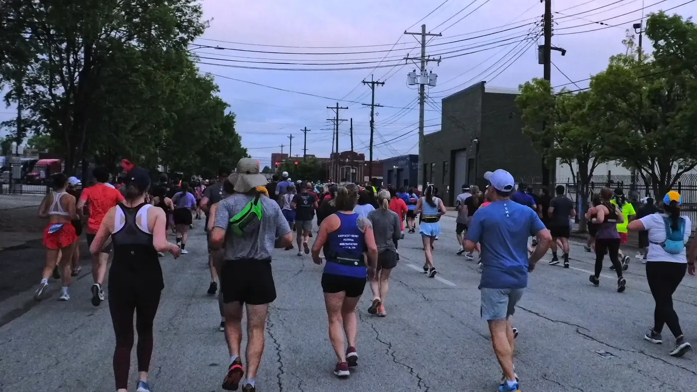 Crowd moving through the neighborhood