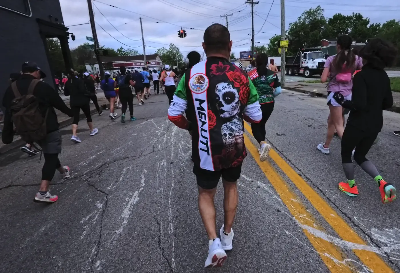 Runner in a Derby-patterned vest