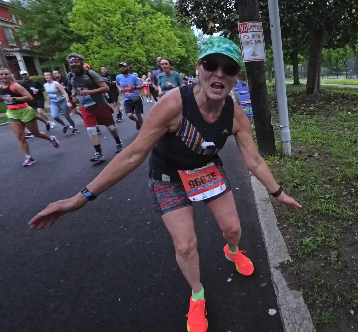 Runner friend throwing arms wide