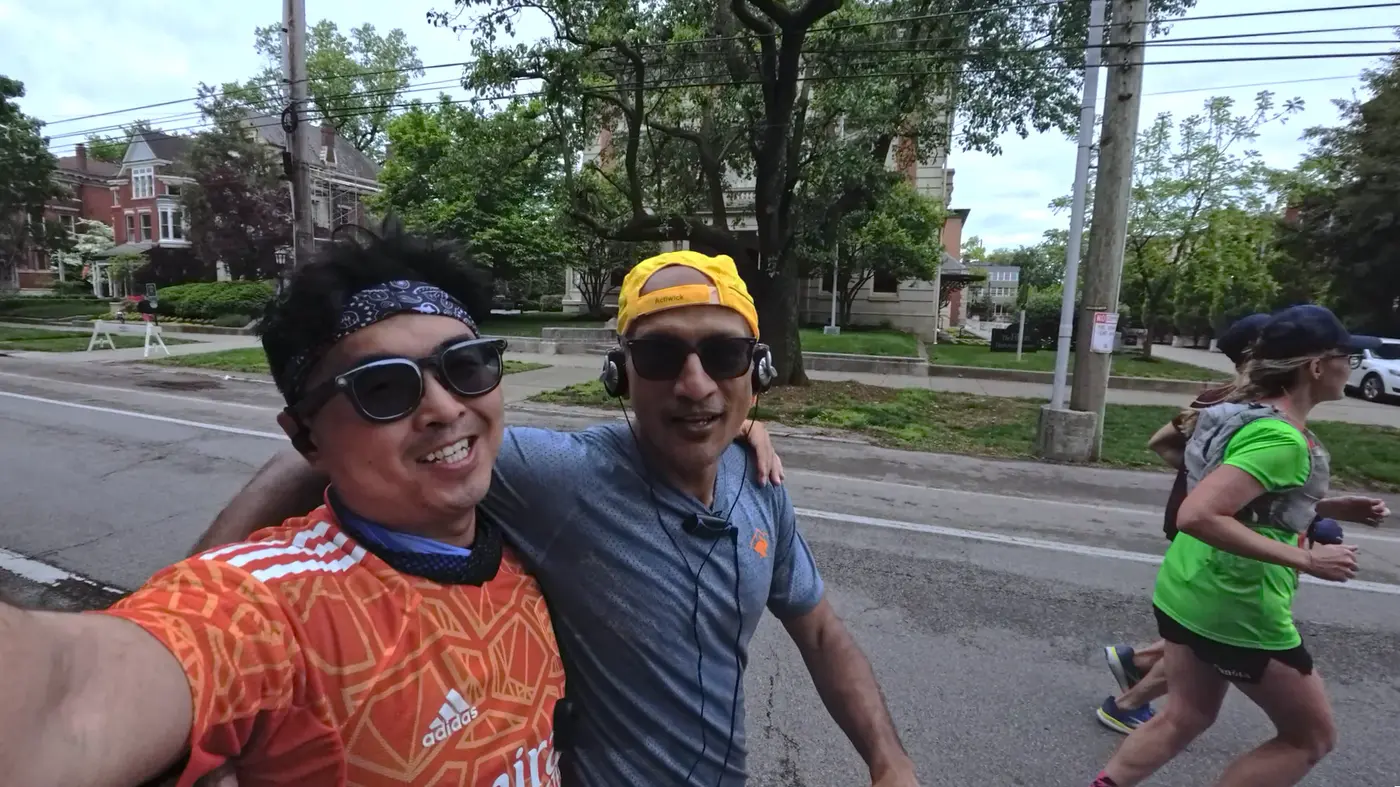Selfie with a friend in a yellow cap