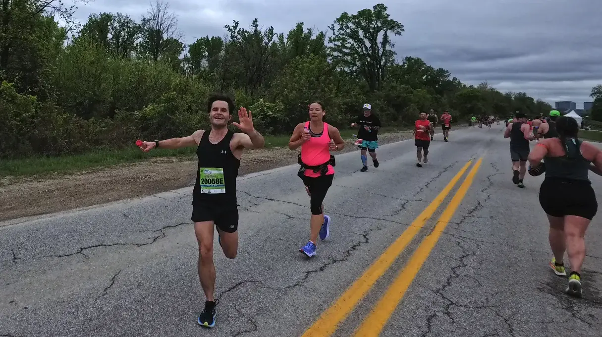 Runners on the quiet mile 25 road