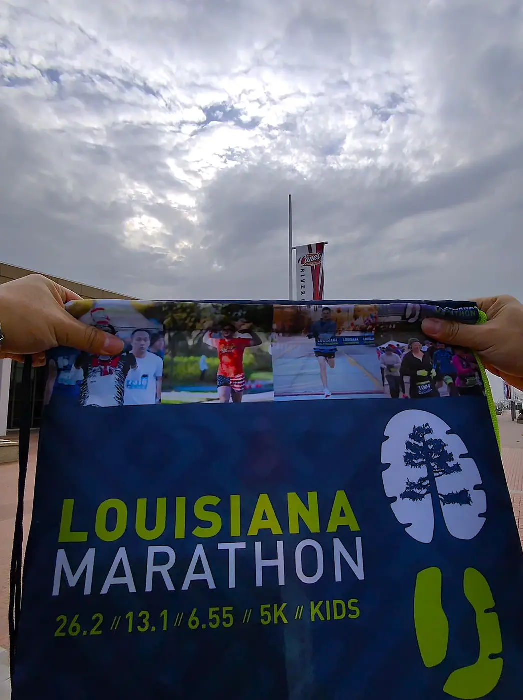 Louisiana Marathon poster against the sky