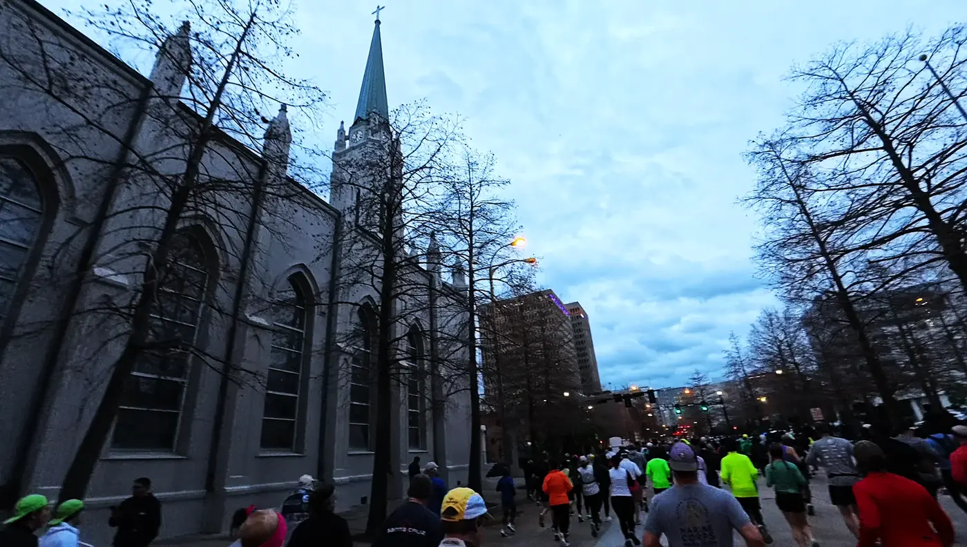 Church steeple rising over the first miles