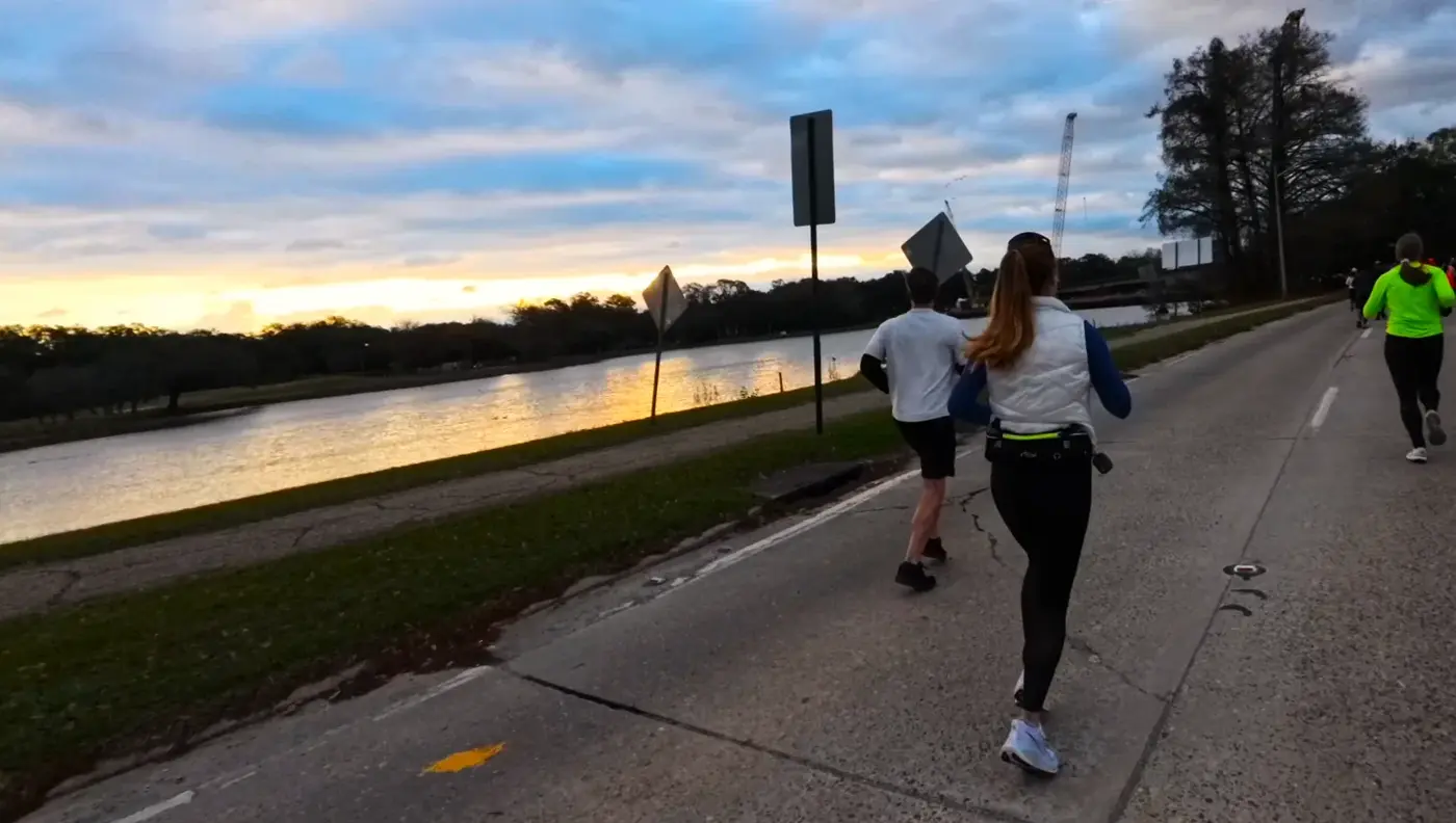 Running beside the lake at daybreak