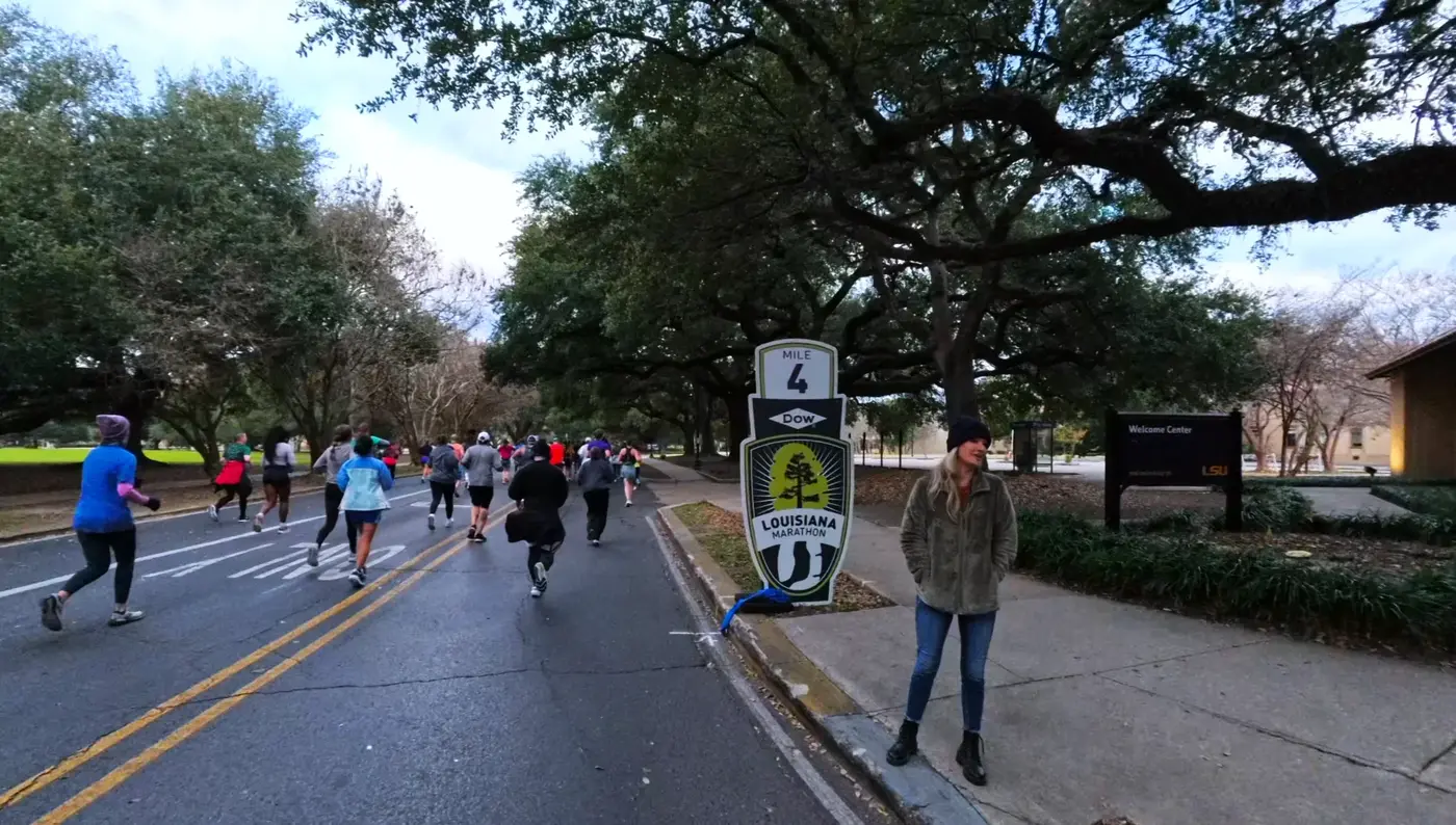 Mile 4 sign under live oaks