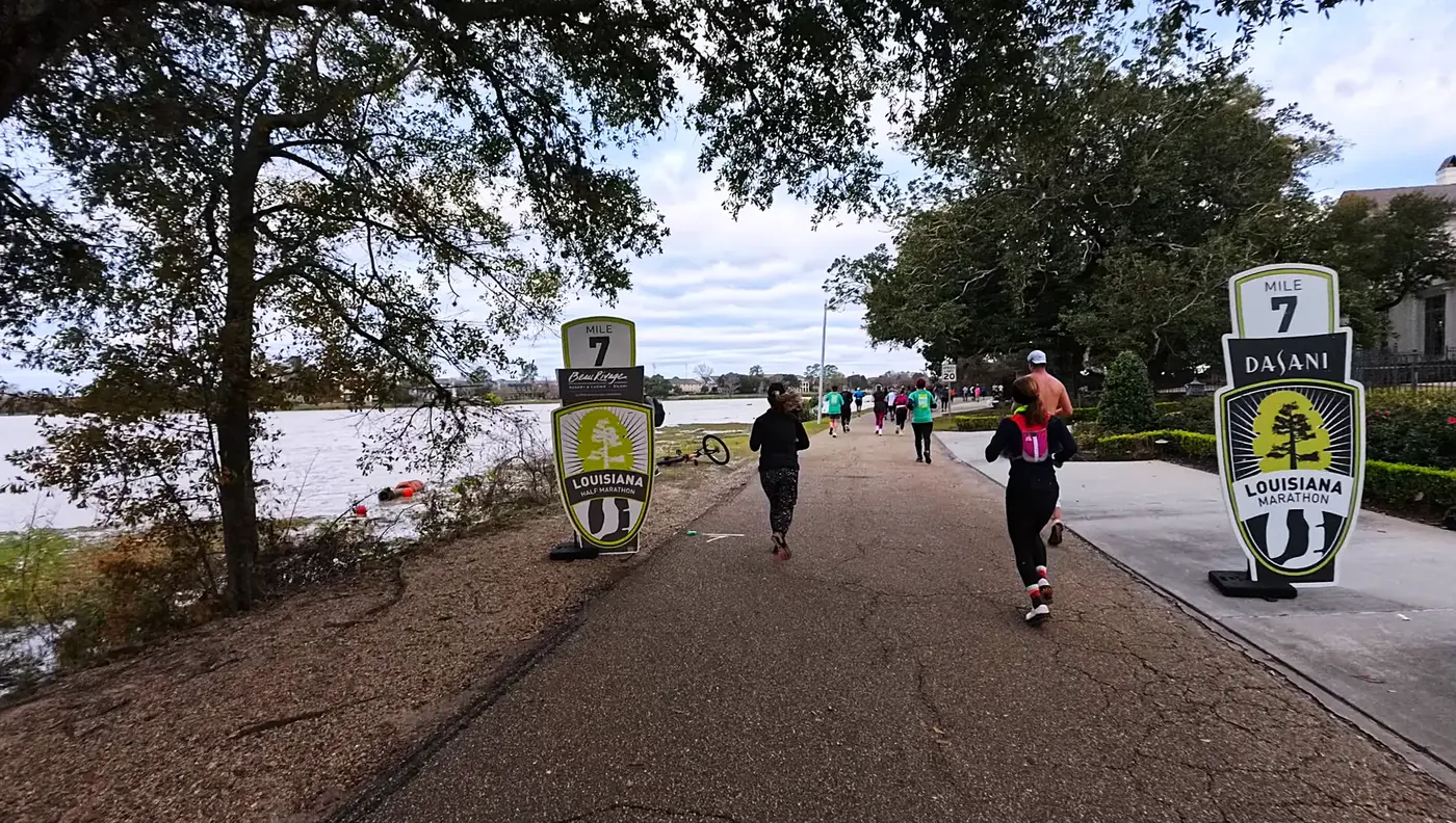 Mile 7 sign along the lakeside path