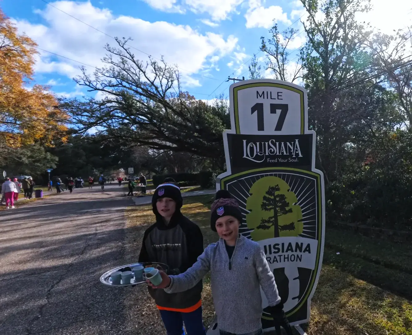 Mile 17 photo with Siqi by the marker