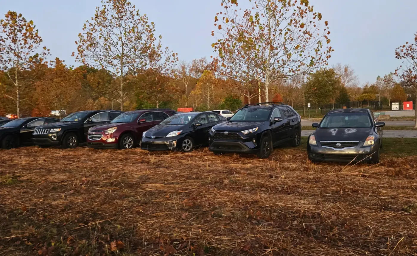 grass parking field filling up