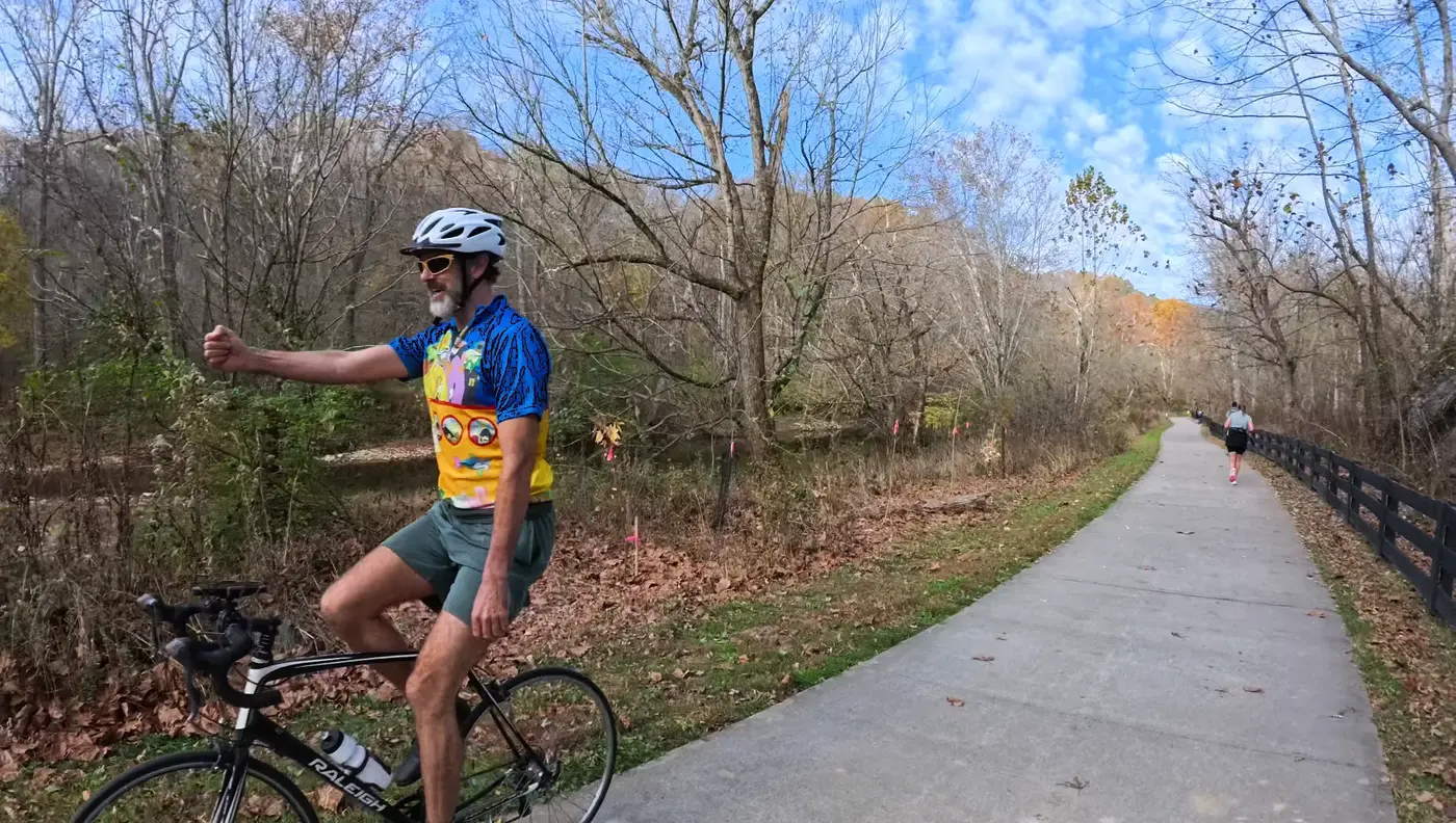 bike volunteer patrolling beside the
