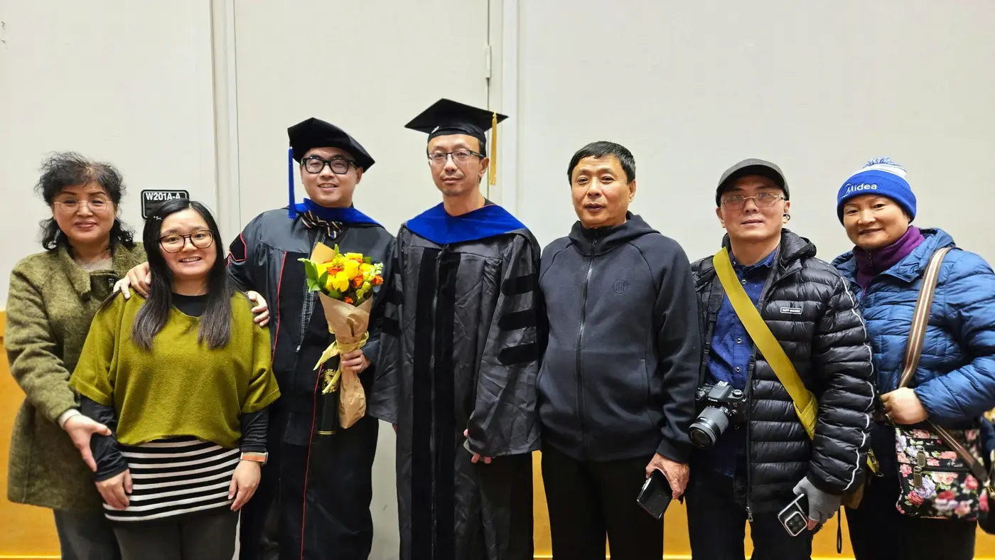 Family photo in the graduation hall