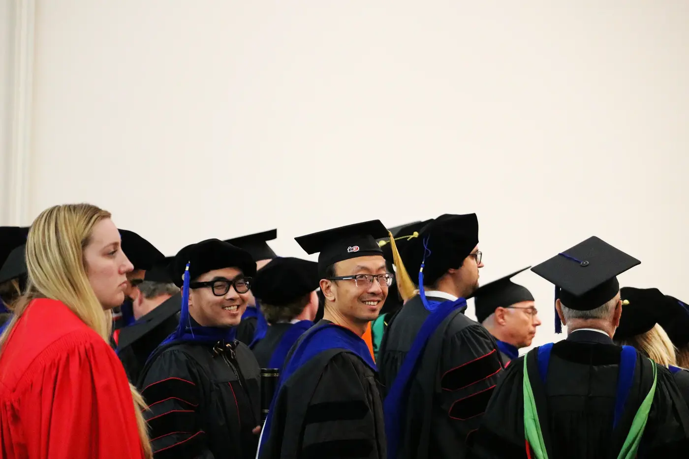 Doctoral graduates entering the ceremony