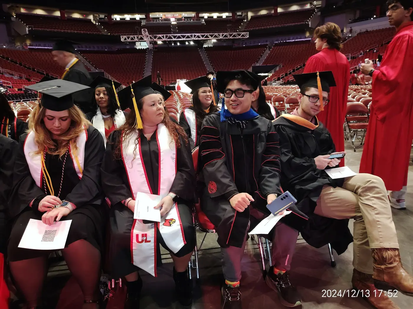 Graduates seated inside Yum Center