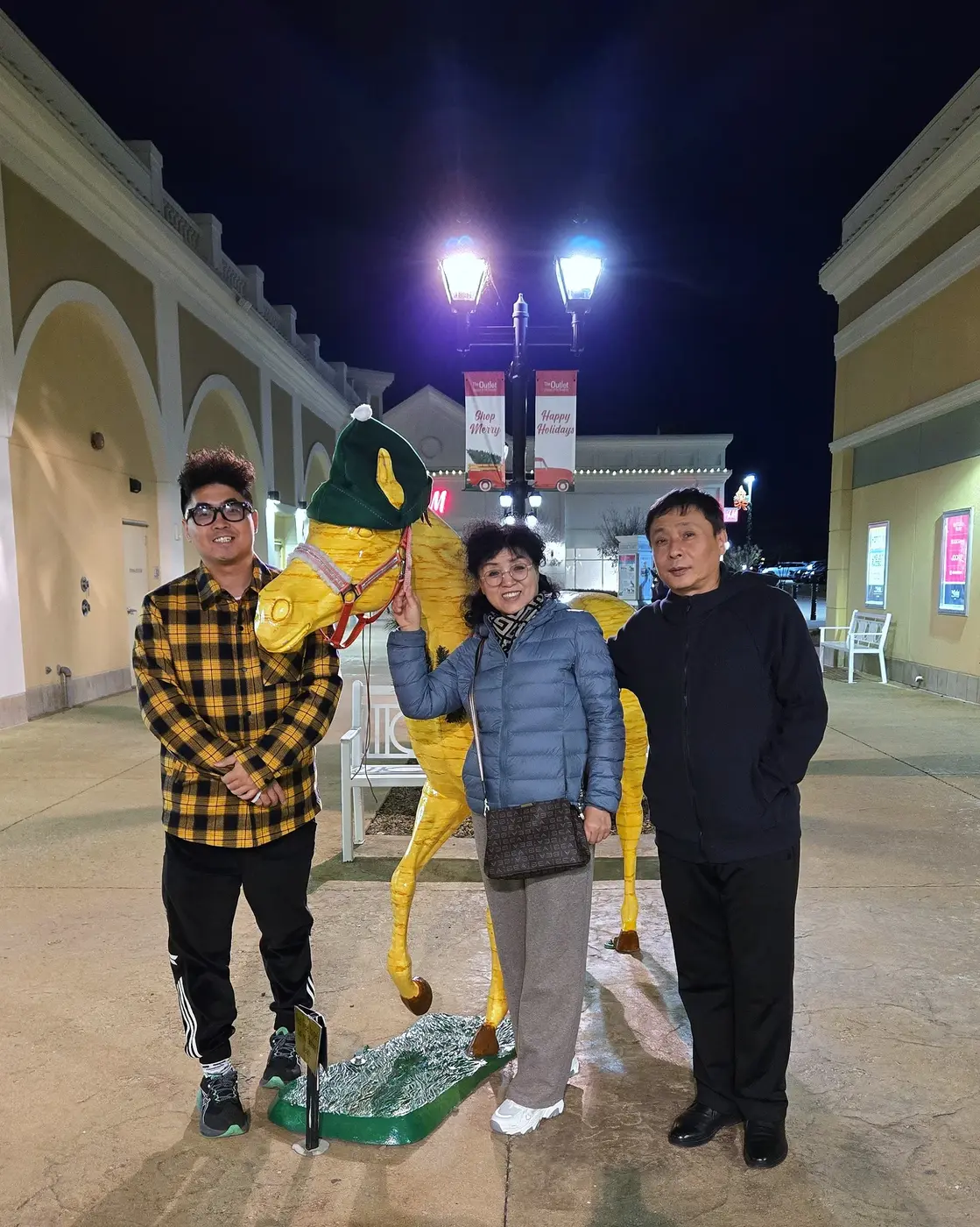 little team under Christmas lights