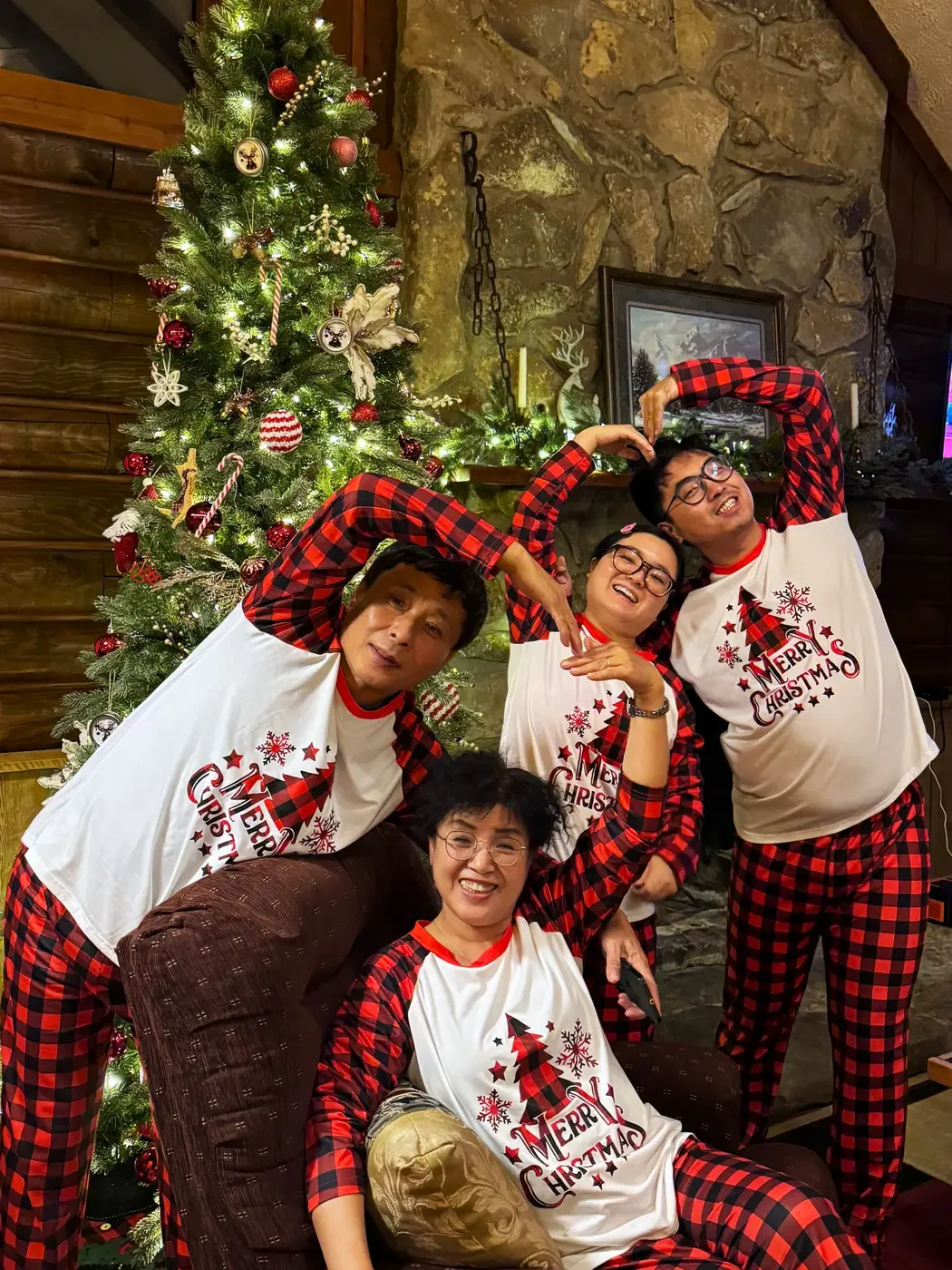 Family heart around the Christmas tree