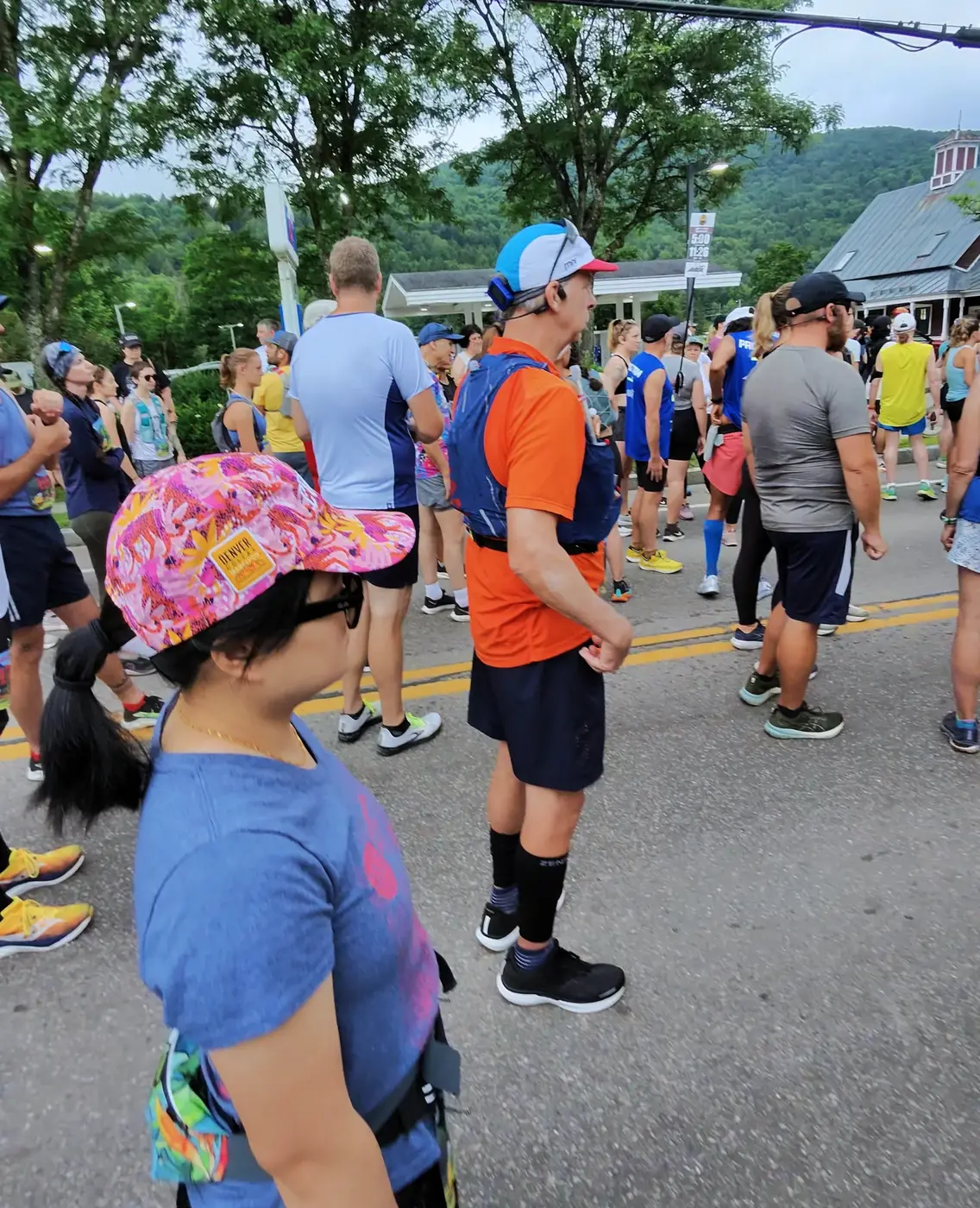 Runners waiting in the village street