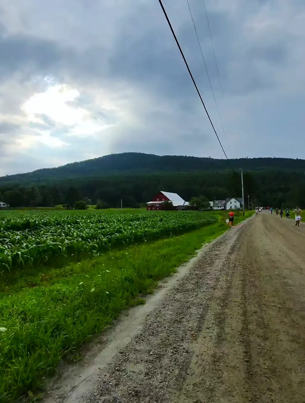 Dirt road dropping toward the hills