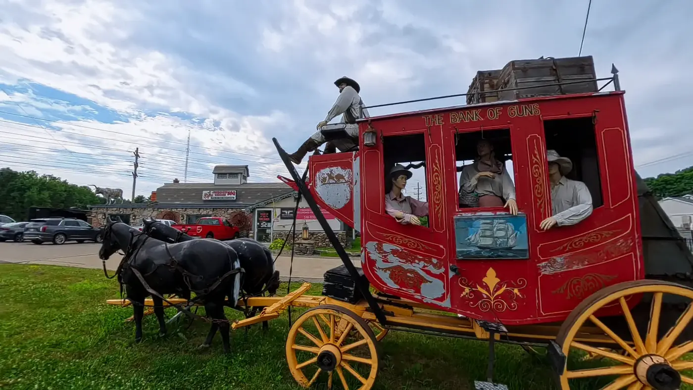Stagecoach display beside the road