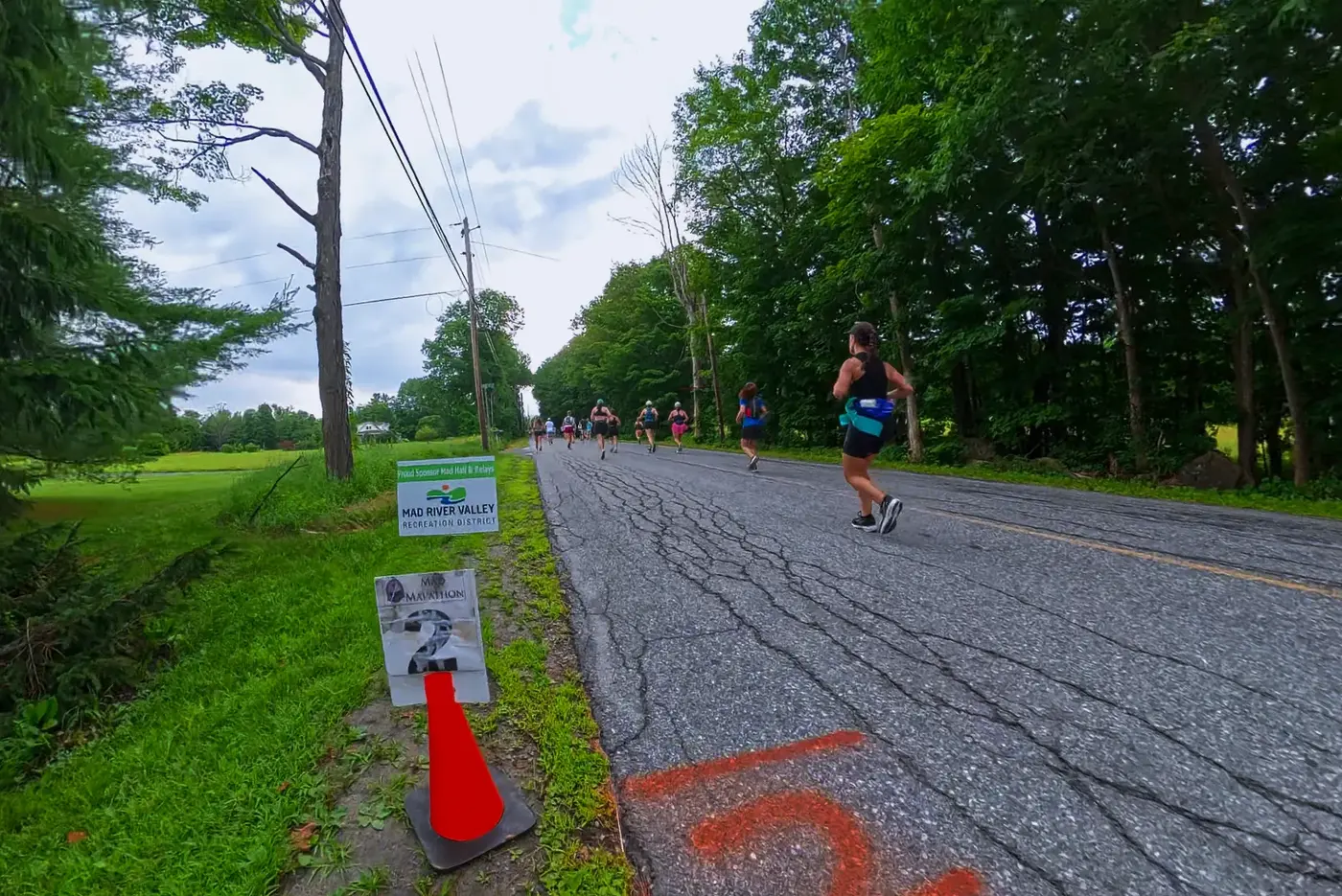 Mile 1 sign on the gravel road