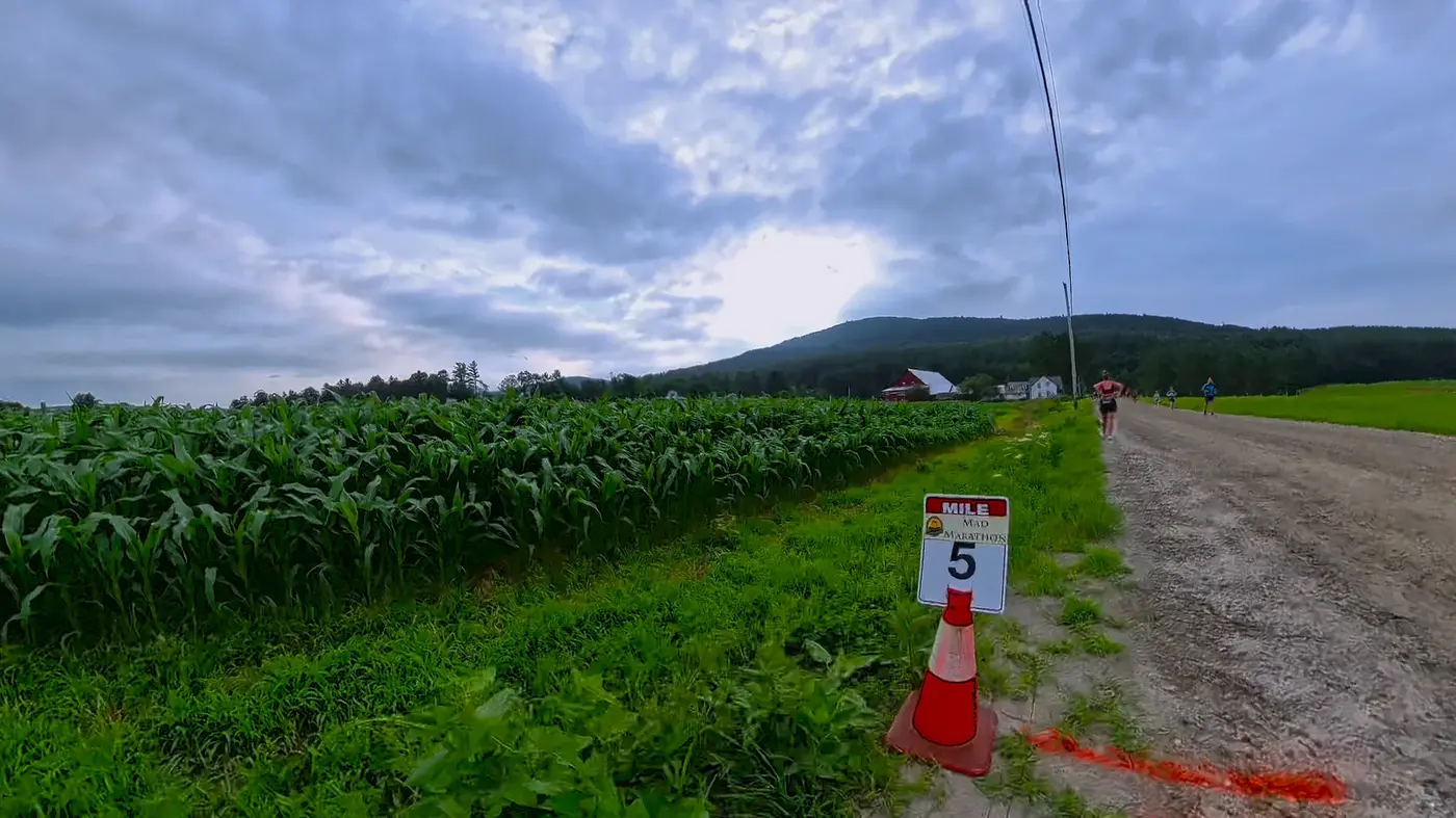 Mile 5 marker beside the corn