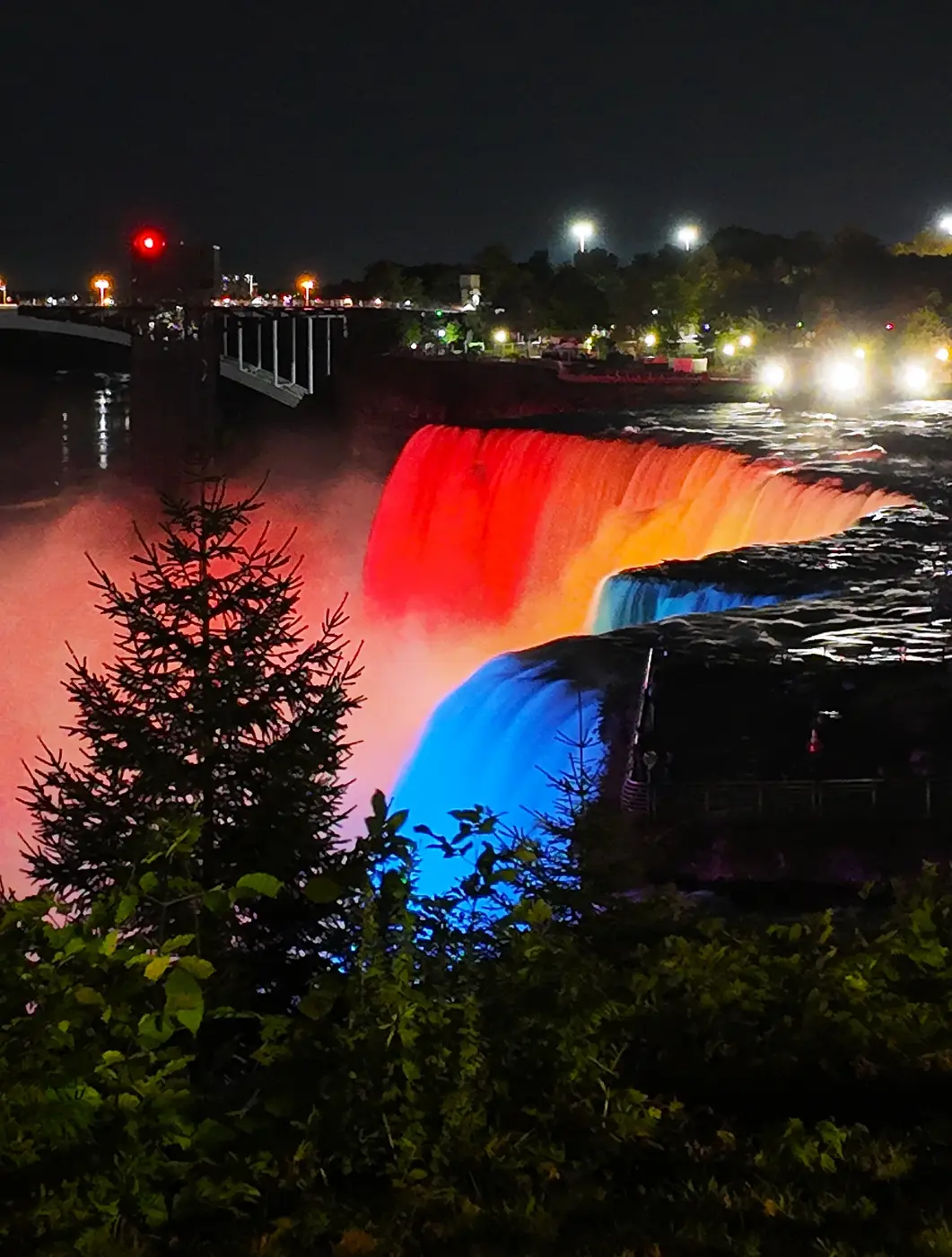 Red-orange lights on the falls