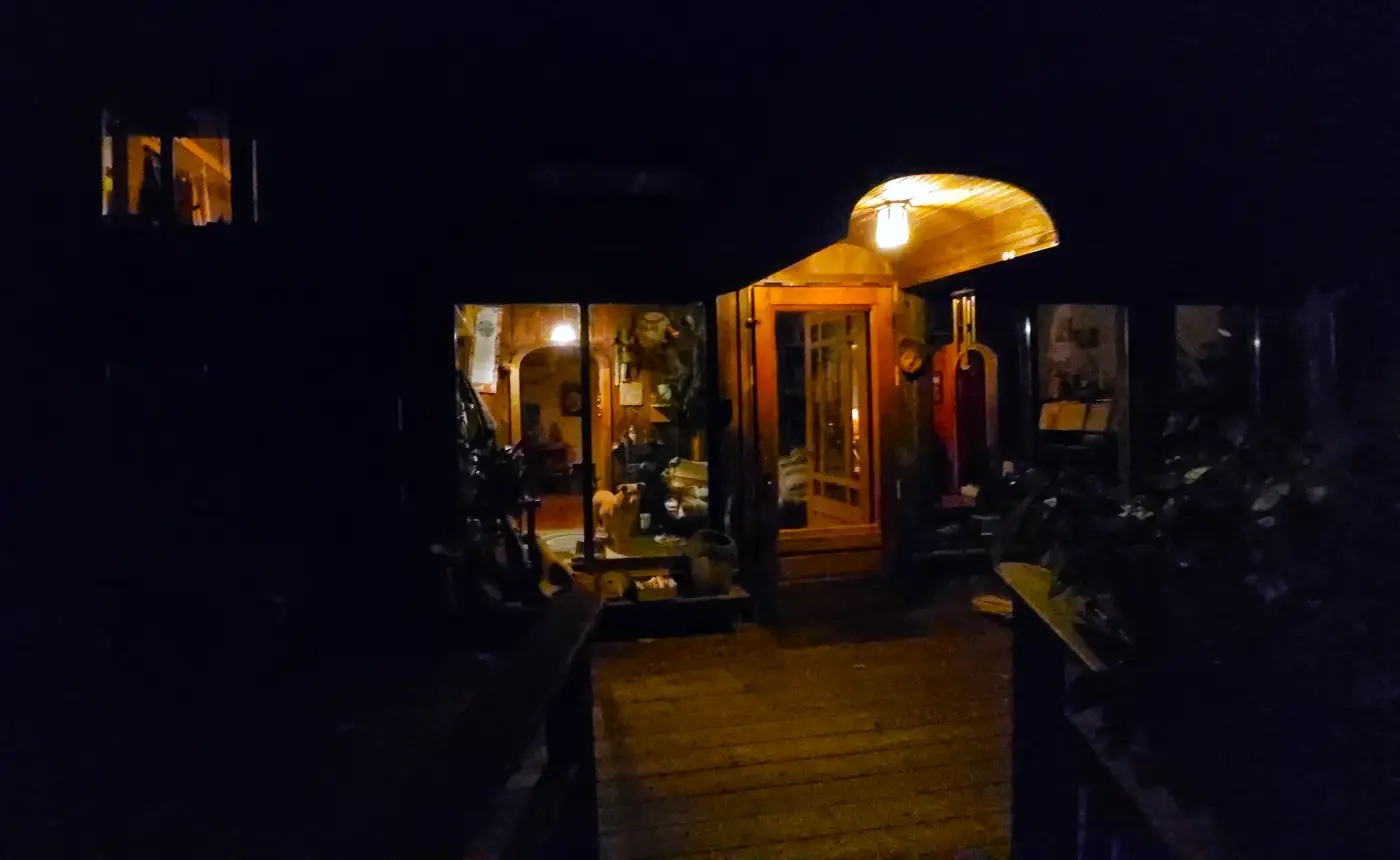 Airbnb cabin glowing in the dark forest