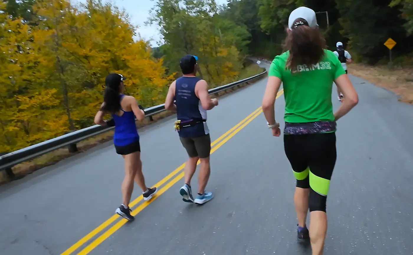 Runners moving through the early rolling