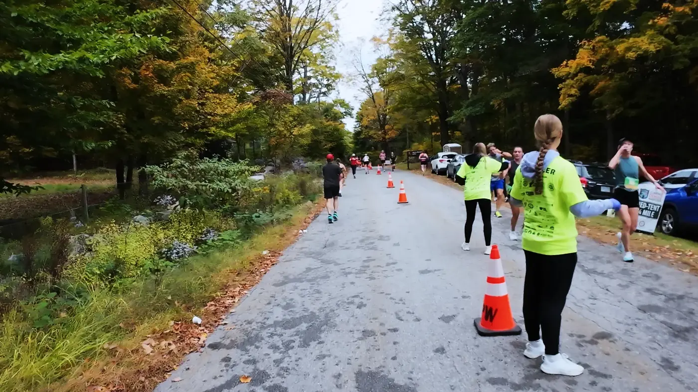 Volunteers and cones near the lake section