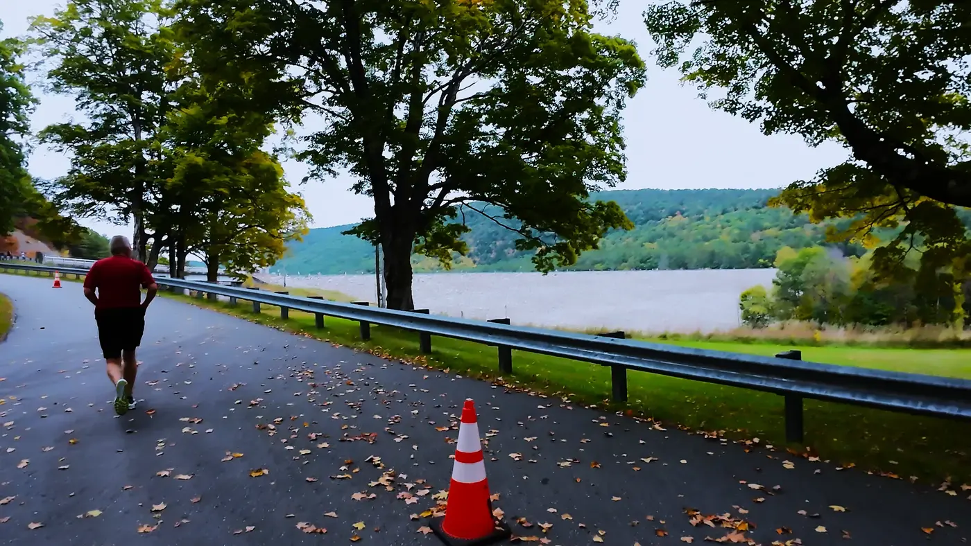 Running beside the water at Surry Mountain