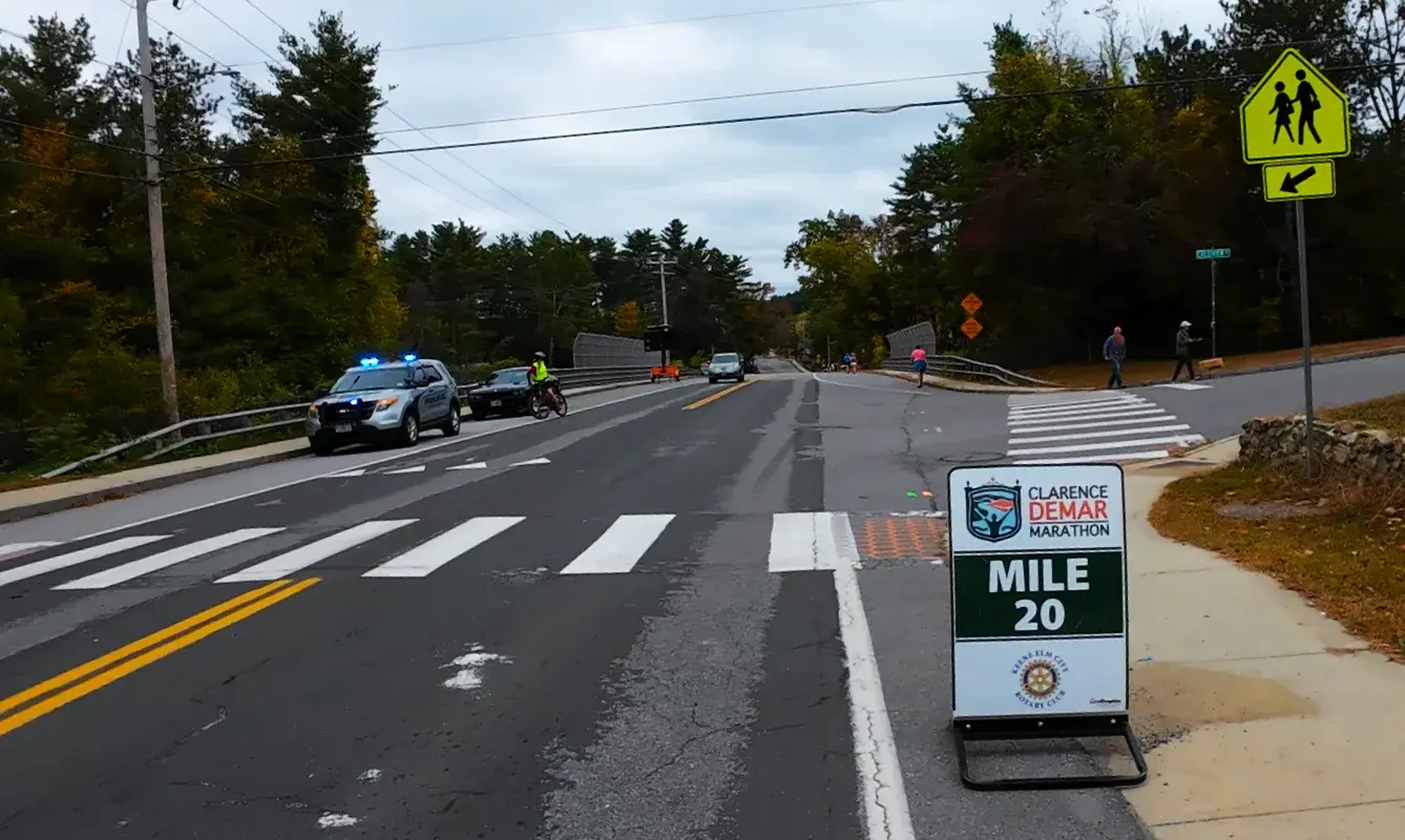Mile 20 marker at the crosswalk